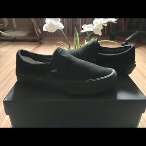 Black slip on Vans